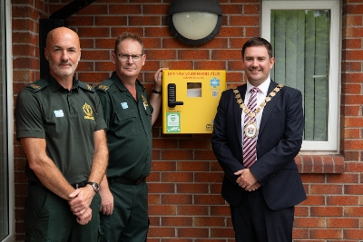 Mayor of Ards and North Down, Councillor Craig Blaney alongside Michael Allen and Gareth Browne, Northern Ireland Ambulance Service