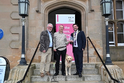 1 – The Mayor of Ards and North Down, Councillor Craig Blaney alongside L-R, Robert Shilliday, RNIB NI Country Director and Ken Carson, RNIB NI Ambassador with guide dog Waffle.